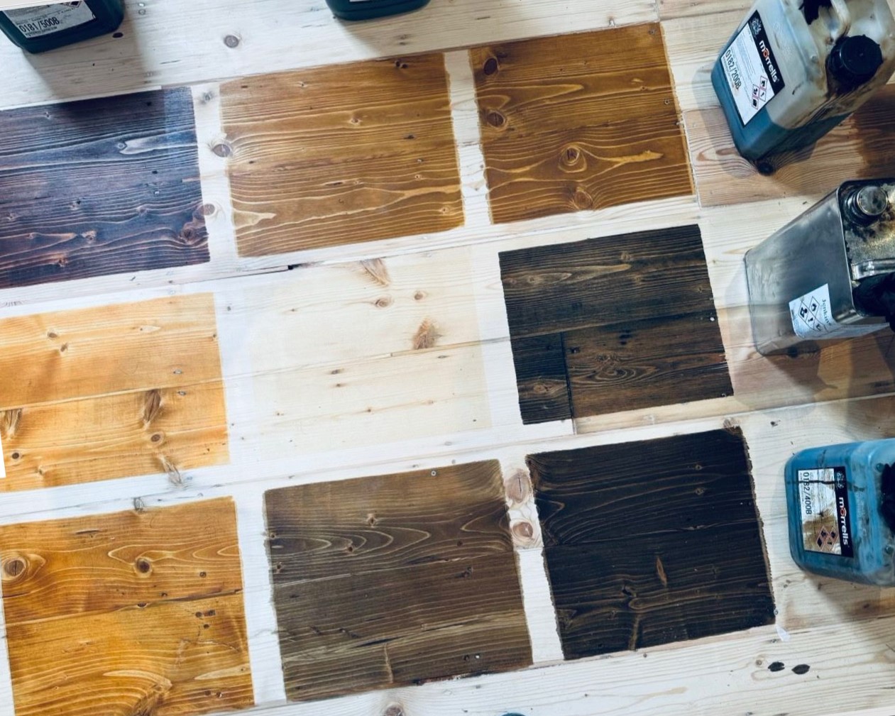 Stain colour swatches tested on sanded Victorian pine floorboards (softwood) in Eltham, helping choose the final finish for Hardwood Floors.